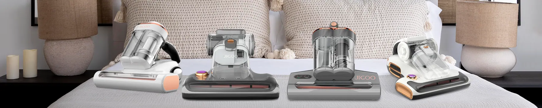 Jigoo mattress vacuum lineup arranged on a bed